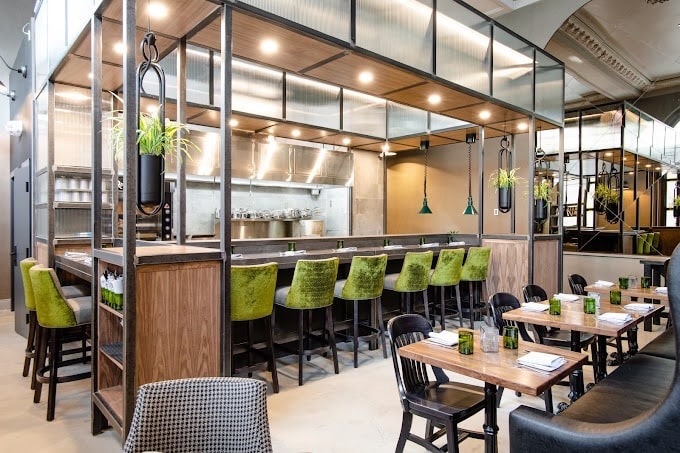 a restaurant with tables and chairs after regina cleaning